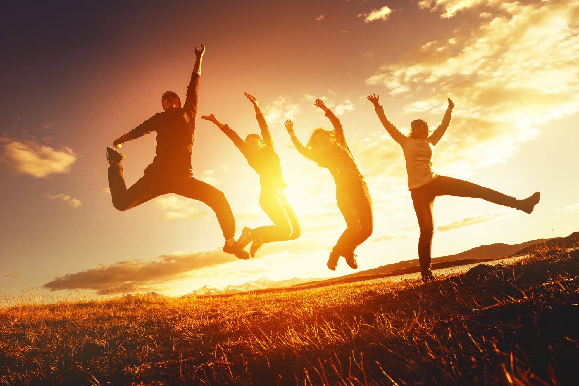 stock-photo-teamwork-success-concept-with-group-of-jumping-friends-504560167